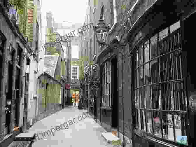 A Hidden Courtyard In London, Surrounded By Old Buildings. The Invisible City: Travel Attention And Performance