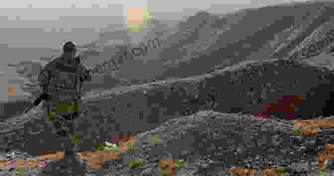 A Photo Of A Soldier In Afghanistan, Looking Out At The Mountains. Un American: A Soldier S Reckoning Of Our Longest War