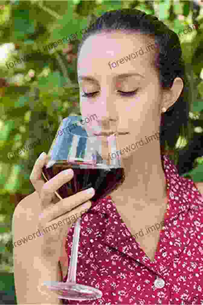 A Woman Swirling And Sniffing A Glass Of Red Wine During A Wine Tasting So You Want To Go Wine Tasting?